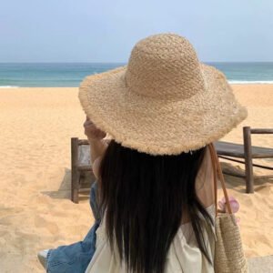Wide-brimmed raffia straw hat